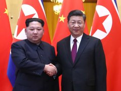 金正恩首次访华受热情接待 中国拿回一张外交牌