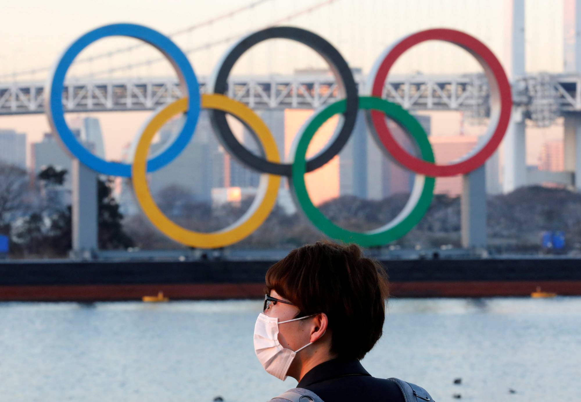 The assurances by Japan's chief Cabinet secretary that the Tokyo Olympics will be held this summer came after Reuters quoted the regulatory reform minister, Taro Kono, as saying the fate of the games 'could go either way.' | REUTERS