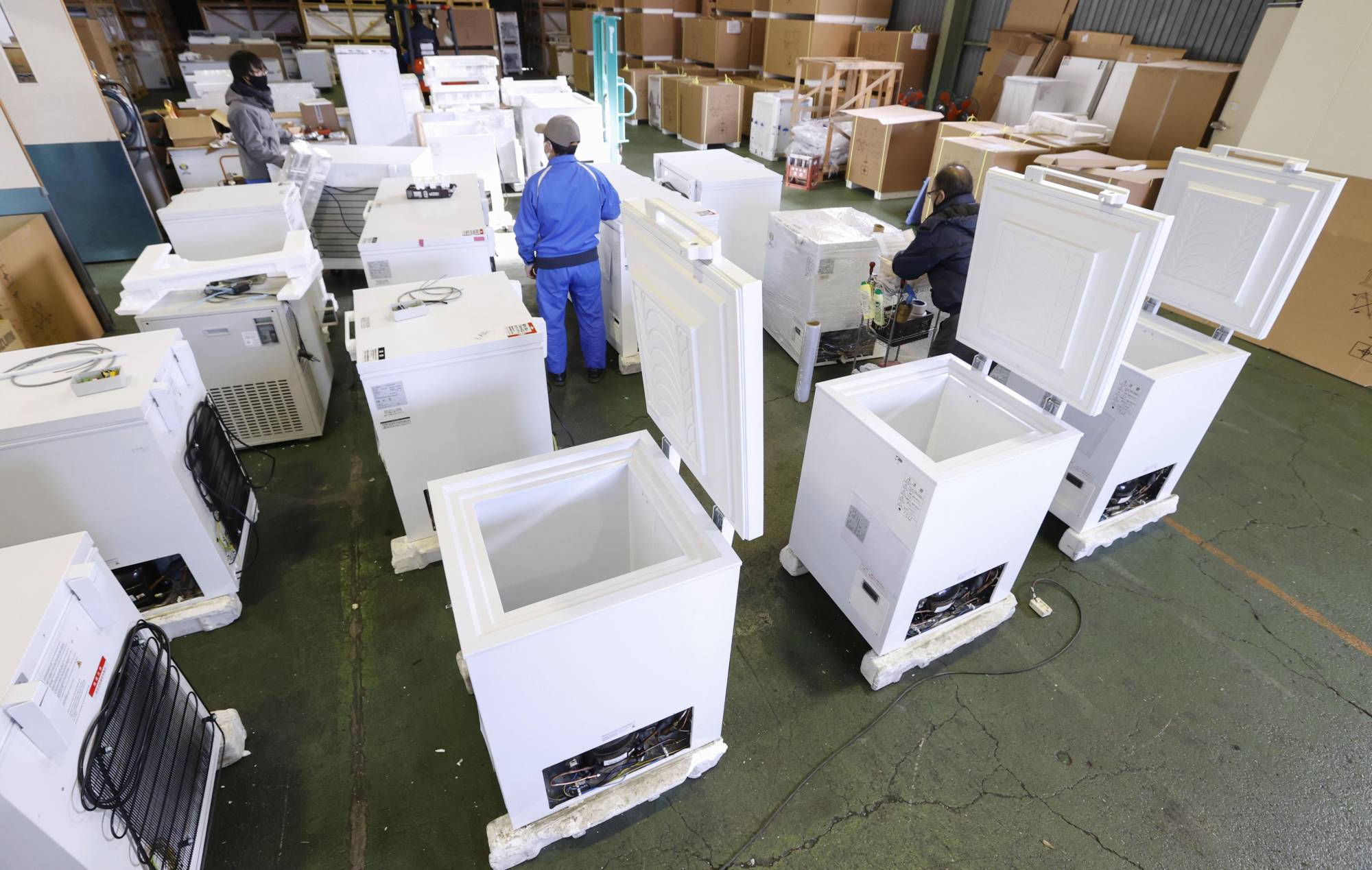 Special freezers that can store COVID-19 vaccines are kept at a company facility in Sagamihara, Kanagawa Prefecture, on Wednesday. | KYODO